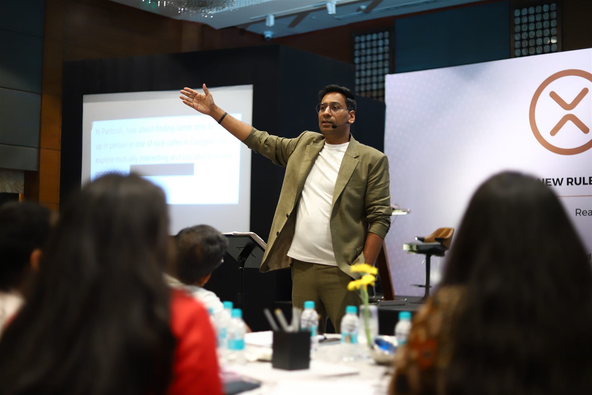 Paritosh Pathak working with a room of business owners