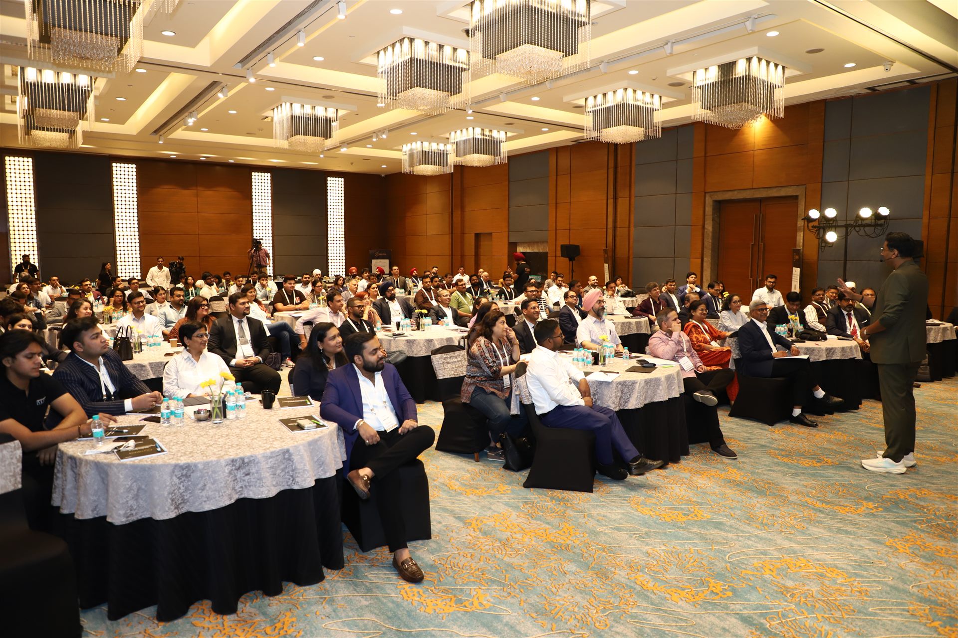 Business owners working at tables during the workshop